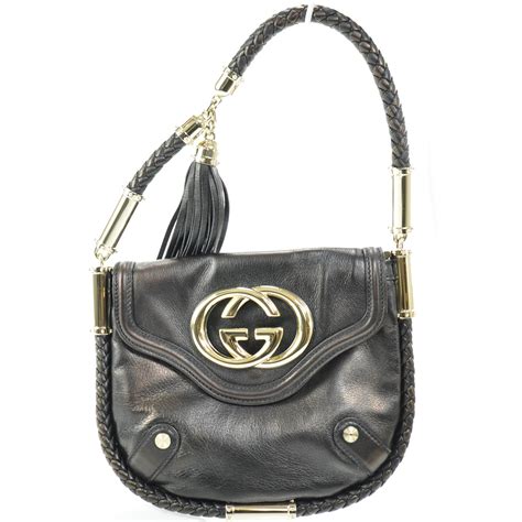 gucci bag with black tassel|Gucci leather shoulder bag.